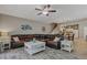 Comfortable living room featuring a large sectional sofa and stylish decor throughout at 4815 Barnstead Dr, Riverview, FL 33578