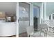 Cozy balcony with seating area and sliding glass door to the living room at 623 Garland Cir, Indian Rocks Beach, FL 33785