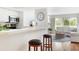 Kitchen view overlooking the living room and balcony area at 623 Garland Cir, Indian Rocks Beach, FL 33785