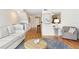 Comfortable living room with hardwood floors, a cozy sofa, and stylish decor at 623 Garland Cir, Indian Rocks Beach, FL 33785