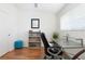Office space with wood floors, a glass desk, a bookcase, and ample natural light at 623 Garland Cir, Indian Rocks Beach, FL 33785