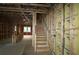 Interior framing of a home featuring a staircase at 6605 N Nebraska Ave # 6, Tampa, FL 33604