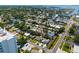 Expansive aerial view showcasing the neighborhood, waterways, and lush greenery in this desirable residential area at 6750 Hibiscus S Ave, South Pasadena, FL 33707