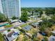 Bird's eye view showcases neighborhood homes near tall buildings and well established trees at 6750 Hibiscus S Ave, South Pasadena, FL 33707