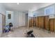 Partially remodeled bathroom featuring ceramic floors, a door and windows at 6750 Hibiscus S Ave, South Pasadena, FL 33707