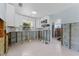 Bright kitchen featuring white cabinets and a view of the backyard through the window at 6750 Hibiscus S Ave, South Pasadena, FL 33707