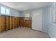 Renovated living space featuring two windows and an exterior door at 6750 Hibiscus S Ave, South Pasadena, FL 33707
