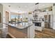 Beautiful kitchen with stainless steel appliances, a large island and ample counter space at 7627 Artifact Dr, Zephyrhills, FL 33541