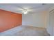 Bedroom with carpet, ceiling fan, and a closet at 8064 Brentwood Rd, Seminole, FL 33777
