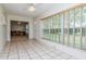Bright living room with neutral carpet, a window and fresh paint at 8064 Brentwood Rd, Seminole, FL 33777