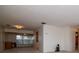 Bright living room featuring neutral carpet, and a dining room with a view at 8064 Brentwood Rd, Seminole, FL 33777