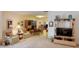 Cozy living room with comfortable seating, open floor plan with view to dining area at 8064 Brentwood Rd, Seminole, FL 33777