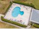 Overhead view of a unique shaped community pool, surrounded by lounge chairs at 8064 Brentwood Rd, Seminole, FL 33777