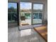 The balcony has sliding glass doors with views of the surrounding neighborhood at 880 Mandalay Ave # S302, Clearwater Beach, FL 33767