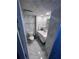 Bathroom featuring marble-style tiles, a modern sink, and sleek fixtures at 880 Mandalay Ave # S302, Clearwater Beach, FL 33767
