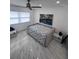Bright bedroom featuring stylish daybed, recessed lighting, and modern decor at 880 Mandalay Ave # S302, Clearwater Beach, FL 33767