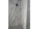 Modern shower featuring sleek fixtures and marble-style tiles at 880 Mandalay Ave # S302, Clearwater Beach, FL 33767