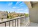 A charming view from the balcony showcasing the well-kept neighboring community at 8848 Moonlit Meadows Loop, Riverview, FL 33578