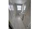 Bathroom with tile floors, white vanity and storage space at 10208 Oak Hill Dr, Port Richey, FL 34668