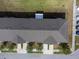Overhead view of townhomes showing the roof and parking areas at 10436 Rivercrest Dr, Riverview, FL 33578
