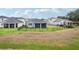 Spacious fenced-in backyard offers privacy and room for outdoor activities at 10736 Whitland Grove Dr, Riverview, FL 33578