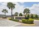 Welcoming entrance to Providence Reserve with lush landscaping and elegant community signage at 10736 Whitland Grove Dr, Riverview, FL 33578