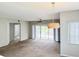 Spacious living room with large windows offering plenty of natural light at 11351 Shipwatch Ln # 1844, Largo, FL 33774