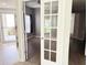 Home office with hardwood floors and lots of natural light at 11351 Shipwatch Ln # 1844, Largo, FL 33774