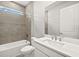 Well lit bathroom with a shower and tub combination, plus a modern sink and countertop at 11470 Myakka Blue Dr, Venice, FL 34293