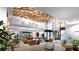 A modern lounge area featuring stylish seating, contemporary lighting, and ample natural light at 11470 Myakka Blue Dr, Venice, FL 34293