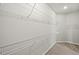 Walk-in closet with built in white wire shelving on all sides at 11470 Myakka Blue Dr, Venice, FL 34293