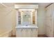 Bathroom vanity with patterned wall coverings and shower-tub combo at 11940 Terra Ceia Ave, New Port Richey, FL 34654