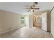 Bright bedroom with tile floor and a large window for natural light at 11940 Terra Ceia Ave, New Port Richey, FL 34654