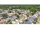 Scenic aerial shot of a residential area showcasing well-maintained homes and verdant landscaping at 12002 Peony Ct, Tampa, FL 33635