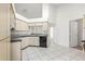 Open kitchen with sleek countertops and modern appliances at 12002 Peony Ct, Tampa, FL 33635