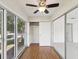 This bedroom has beautiful natural light, wood flooring, and closet space at 128 Brandy Wine Dr, Largo, FL 33771