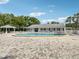 The beautiful community pool features lounge seating and is perfect for hot summer days at 128 Brandy Wine Dr, Largo, FL 33771