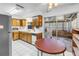 Functional kitchen with stainless steel appliances, tile flooring, and ample counter space at 1301 62Nd S Ter, St Petersburg, FL 33705