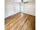 Bedroom featuring new floors and double closets at 13018 Clay Ave, Largo, FL 33773