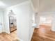 View from the Living Room into the Kitchen, entry way and additional rooms at 13018 Clay Ave, Largo, FL 33773