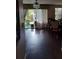 Bright dining area with sliding glass doors to a patio and hardwood flooring at 13020 Lorna Pl, Tampa, FL 33618