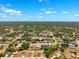An aerial view of the neighborhood showing the community layout and green landscapes at 13040 Hanley Dr, Spring Hill, FL 34609