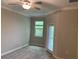 Cozy bedroom with neutral-colored walls, carpet flooring, ceiling fan, and a window providing natural light at 1339 White Fox Run, Lutz, FL 33549