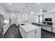 Open-concept living space featuring a large kitchen island and inviting Gathering room at 14727 Eagle Branch Dr, Nokomis, FL 34275