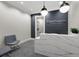 Stylish reception area featuring a modern desk, comfortable seating, and sleek decor at 14727 Eagle Branch Dr, Nokomis, FL 34275