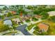 Aerial view of the home with a well-maintained lawn and in a quiet, Gathering-friendly neighborhood at 1535 Crossvine Ct, Trinity, FL 34655