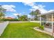 A large, well manicured lawn provides plenty of room to play in the backyard at 1535 Crossvine Ct, Trinity, FL 34655