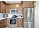 Modern kitchen with stainless steel appliances and sleek countertops at 1535 Crossvine Ct, Trinity, FL 34655