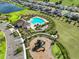 Community amenities featuring pool, playground and clubhouse at 16704 Sunburst Lake St, Wimauma, FL 33598