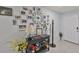 Welcoming entryway featuring tile floors, a decorative wall clock, and a functional storage table for added convenience at 16704 Sunburst Lake St, Wimauma, FL 33598